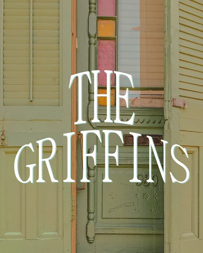 The Griffins — a New Orleans wedding venue door in soft green and pink